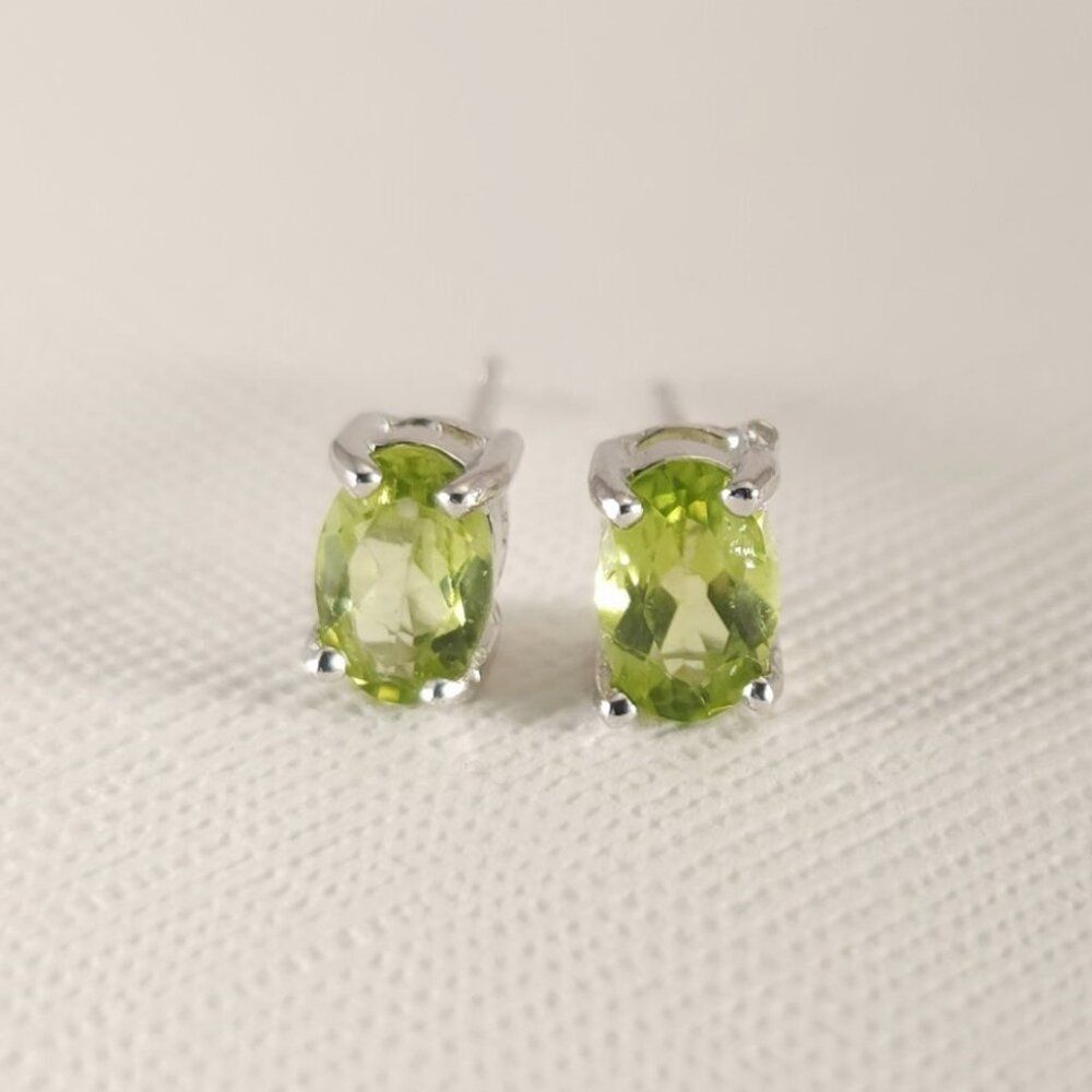 Peridot 1.0 Carat tw Oval Earrings in Sterling Silver
